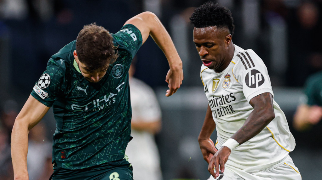 Vinicius contra Rubén Días en el Real Madrid - Manchester City